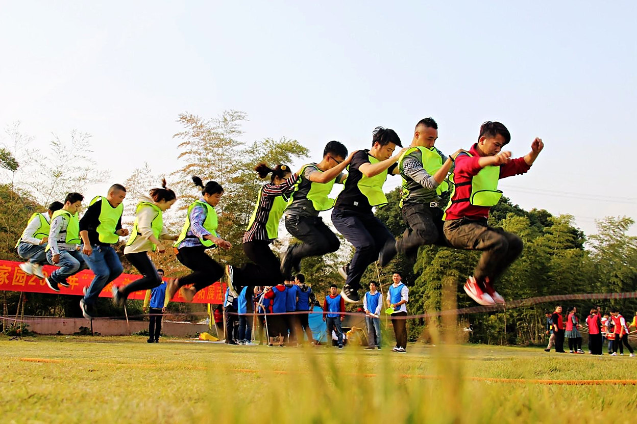 Fuzhihui staff in safety vests during a team day outside Chengdu.